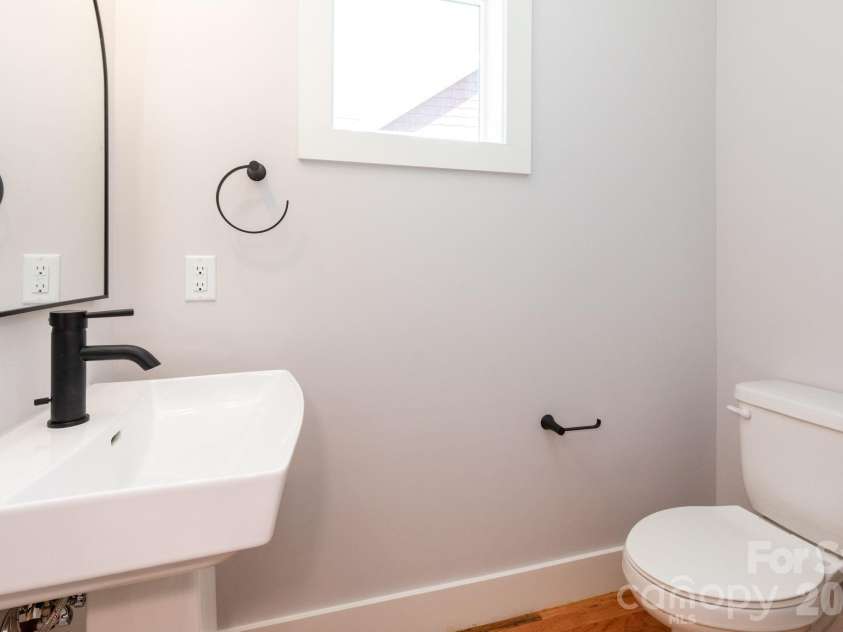 33 Loblolly Lane, Asheville, NC 28803.  MLS# CAR4228799, YatesRealty ID 2885. Main level Half Bathroom