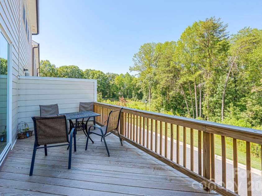 114 Glencoe Lane, Mooresville, NC 28117.  MLS# CAR4364919, YatesRealty ID 28853. Back Deck Overlooking Wooded Area