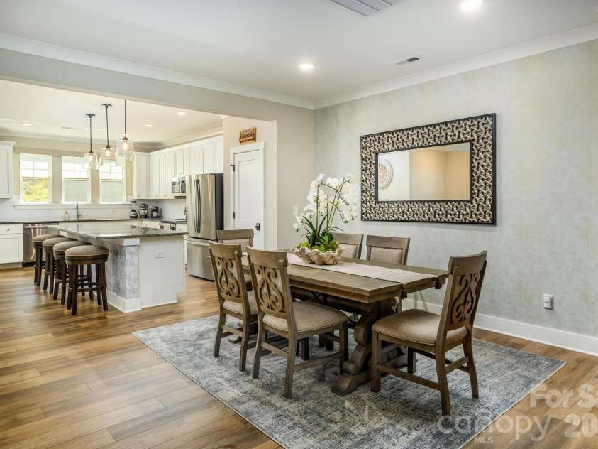 114 Glencoe Lane, Mooresville, NC 28117.  MLS# CAR4364919, YatesRealty ID 28853. Dining Area Open To Kitchen