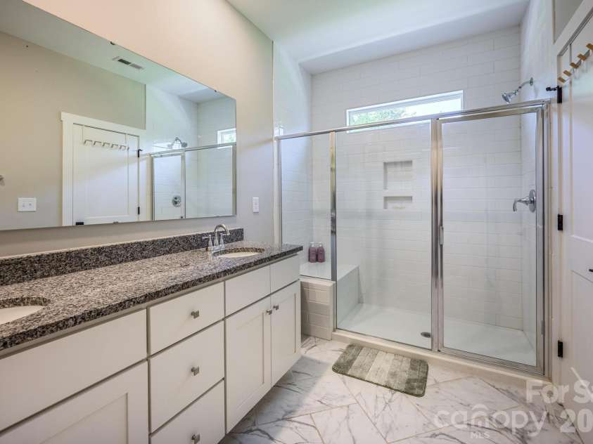 114 Glencoe Lane, Mooresville, NC 28117.  MLS# CAR4364919, YatesRealty ID 28853. Primary Bath w/Extended Walk-In Shower
