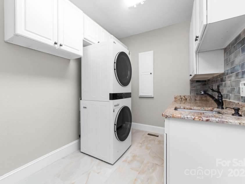 206 Vauxhall Drive, Shelby, NC 28150.  MLS# CAR4285737, YatesRealty ID 28854. Laundry room on main level and second laundry area on upper level. Stack Washer/Dryer do not convey.