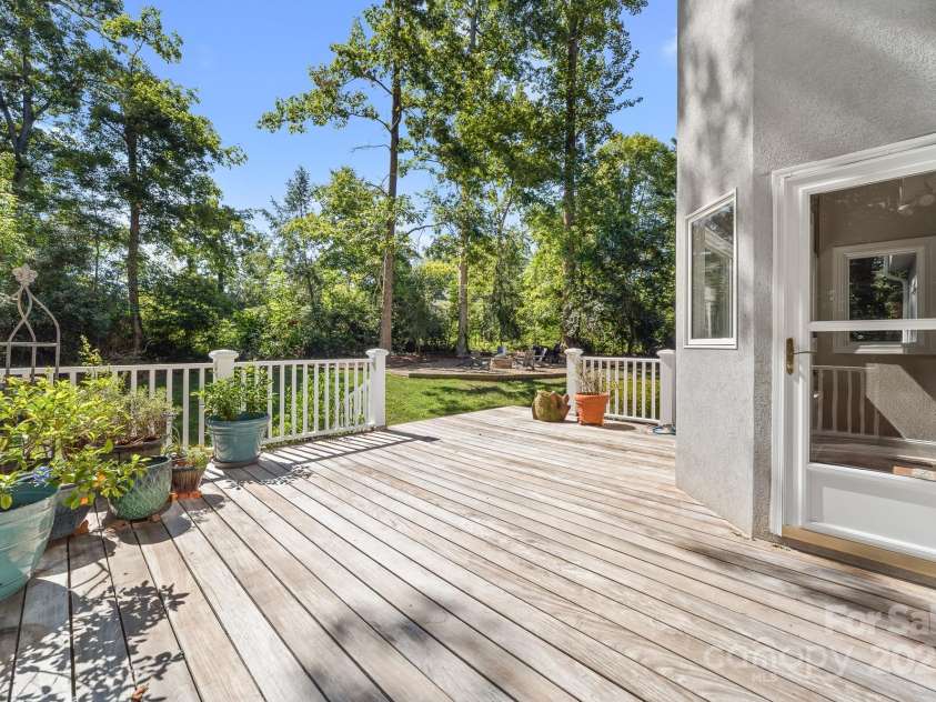 206 Vauxhall Drive, Shelby, NC 28150.  MLS# CAR4285737, YatesRealty ID 28854. Private and peaceful backyard. Large grilling deck, Firepit circle and playhouse. Short golf cart drive to the links and club house.