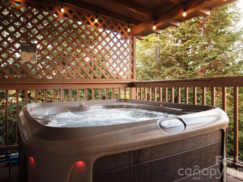658 Biltmore Circle, Bryson City, NC 28713.  MLS# CAR4388547, YatesRealty ID 28854. Hot tub