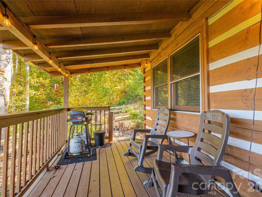 658 Biltmore Circle, Bryson City, NC 28713.  MLS# CAR4388547, YatesRealty ID 28854. Large covered porch facing the mountains