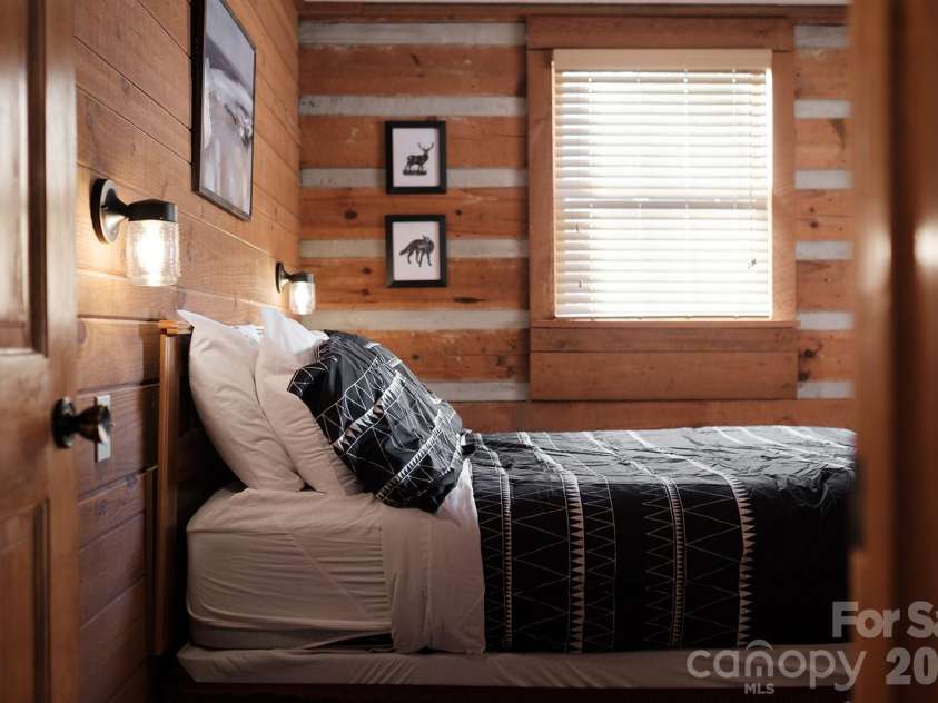 658 Biltmore Circle, Bryson City, NC 28713.  MLS# CAR4388547, YatesRealty ID 28854. Queen Bed secondary bedroom