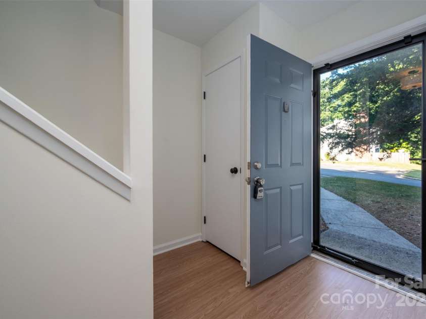 6013 Heath Valley Road, Charlotte, NC 28210.  MLS# CAR4276704, YatesRealty ID 28858. New Floors/ Baseboards/ Molding throughout the entire main living area (September 2025) & New Storm Door (2025)