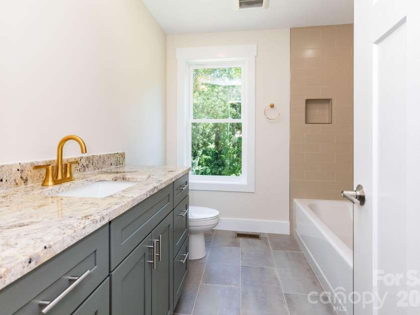 35 Loblolly Lane, Asheville, NC 28803.  MLS# CAR4228836, YatesRealty ID 2886. Hall Bathroom