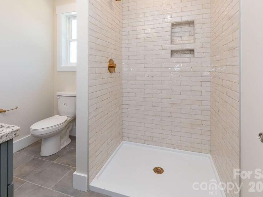 35 Loblolly Lane, Asheville, NC 28803.  MLS# CAR4228836, YatesRealty ID 2886. Primary Bathroom