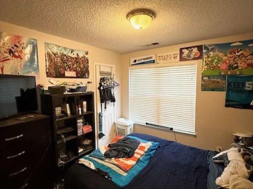 6902 Vernon Wood Lane, Charlotte, NC 28262.  MLS# CAR4266627, YatesRealty ID 28861. Secondary bedroom