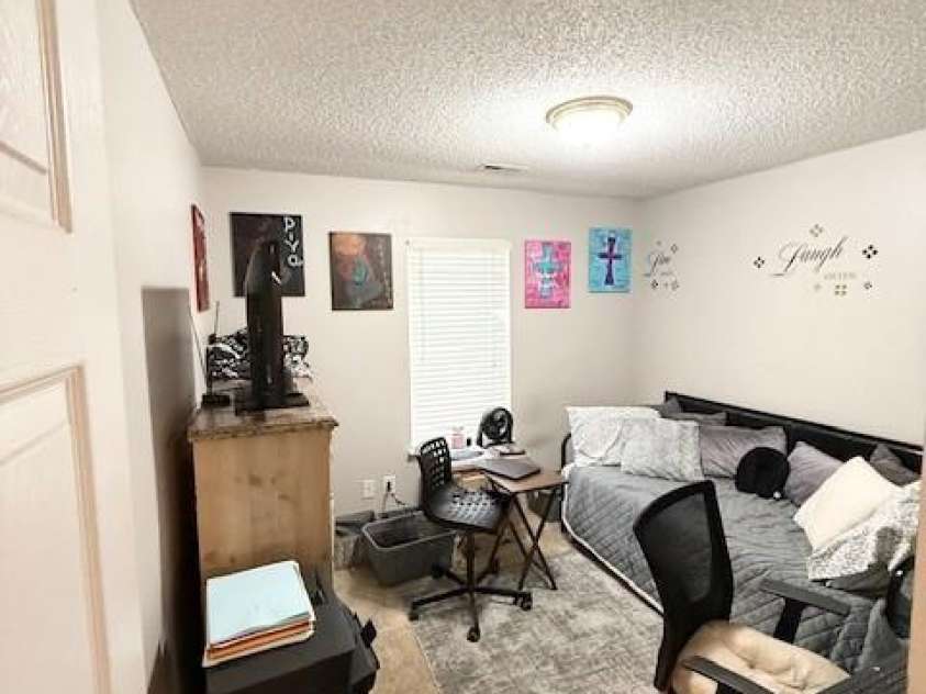 6902 Vernon Wood Lane, Charlotte, NC 28262.  MLS# CAR4266627, YatesRealty ID 28861. Secondary bedroom