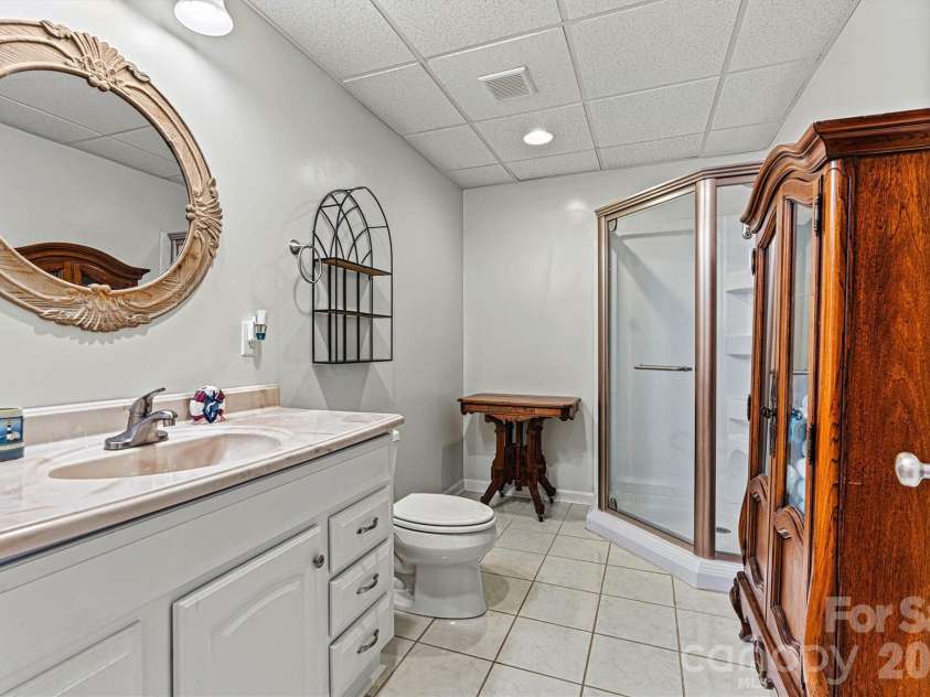 7538 Golf Course Drive, Denver, NC 28037.  MLS# CAR4375183, YatesRealty ID 28863. Full Bathroom in the basement (2nd living quarters)