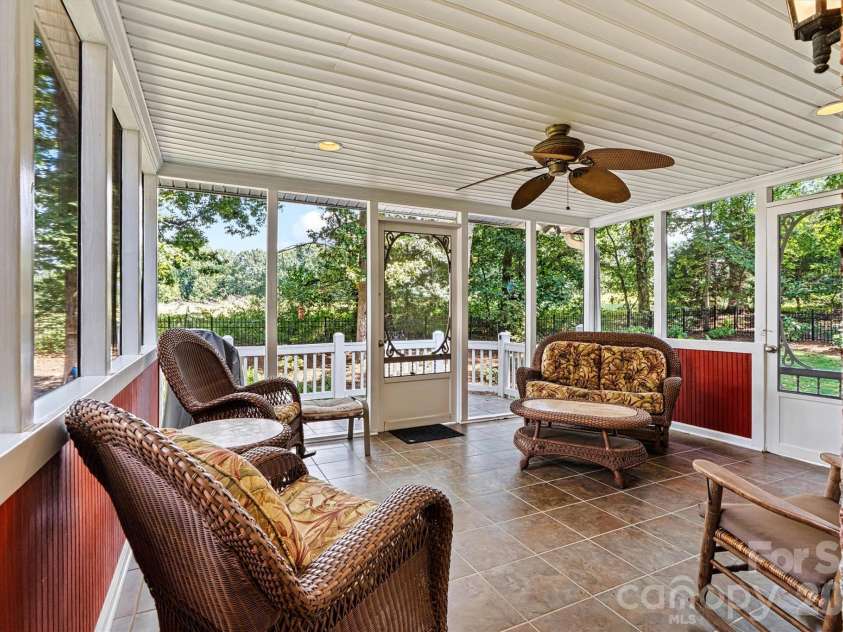 7538 Golf Course Drive, Denver, NC 28037.  MLS# CAR4375183, YatesRealty ID 28863. Screened -in porch leads to back deck