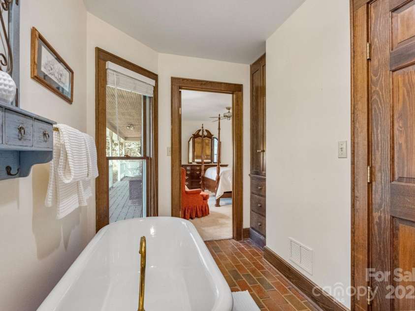 110 Amanda Drive, Matthews, NC 28104.  MLS# CAR4280480, YatesRealty ID 28865. 2nd full bath with clawfoot tub and built-in features