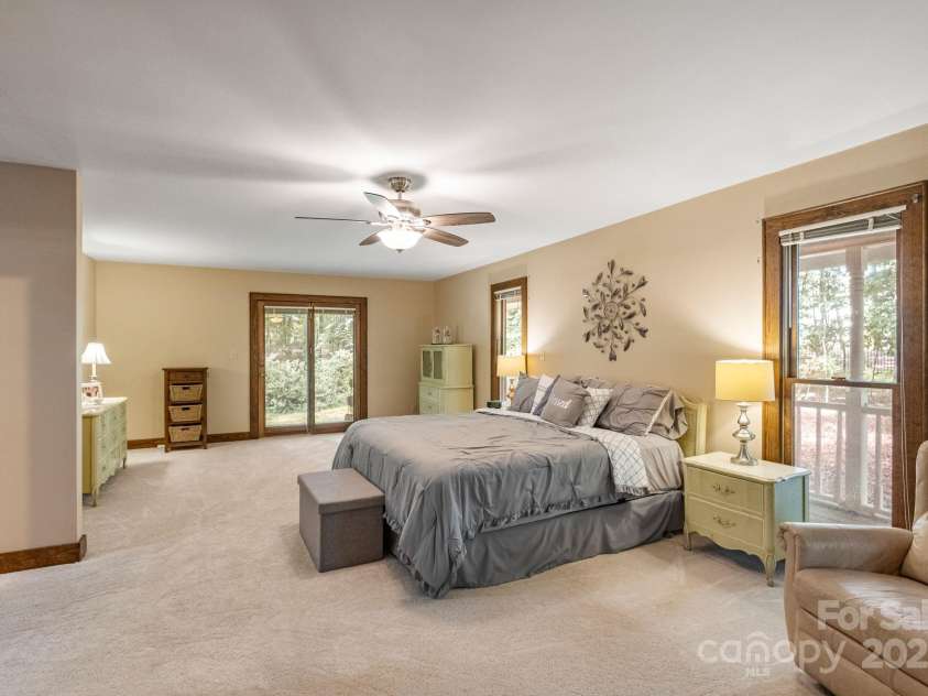 110 Amanda Drive, Matthews, NC 28104.  MLS# CAR4280480, YatesRealty ID 28865. Direct access to the backyard from primary bedroom