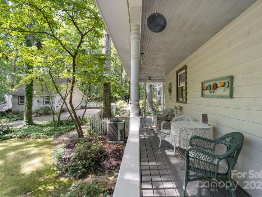 110 Amanda Drive, Matthews, NC 28104.  MLS# CAR4280480, YatesRealty ID 28865. Enjoy morning coffee from this quaint porch spot