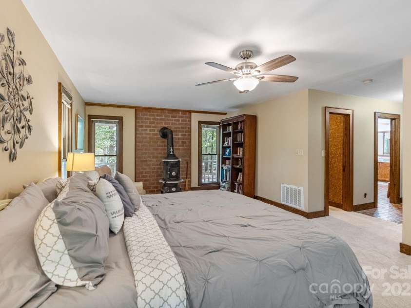 110 Amanda Drive, Matthews, NC 28104.  MLS# CAR4280480, YatesRealty ID 28865. Functioning wood stove