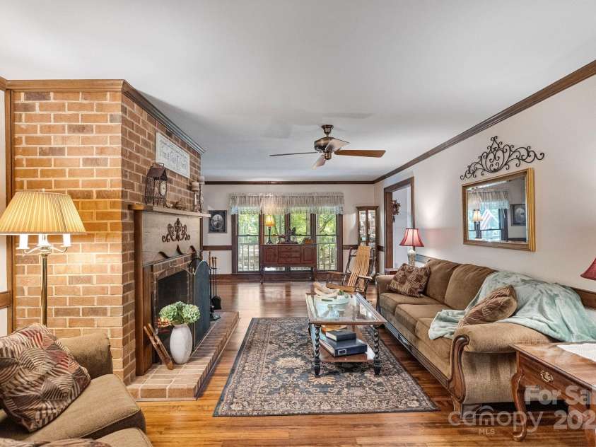 110 Amanda Drive, Matthews, NC 28104.  MLS# CAR4280480, YatesRealty ID 28865. Living room offers a cozy space to gather