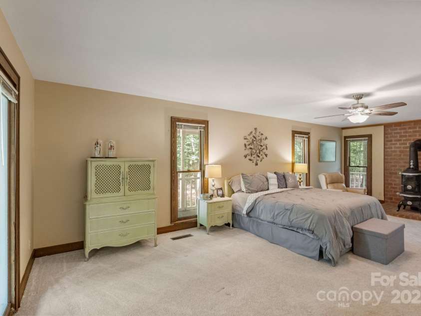 110 Amanda Drive, Matthews, NC 28104.  MLS# CAR4280480, YatesRealty ID 28865. Private main level primary bedroom