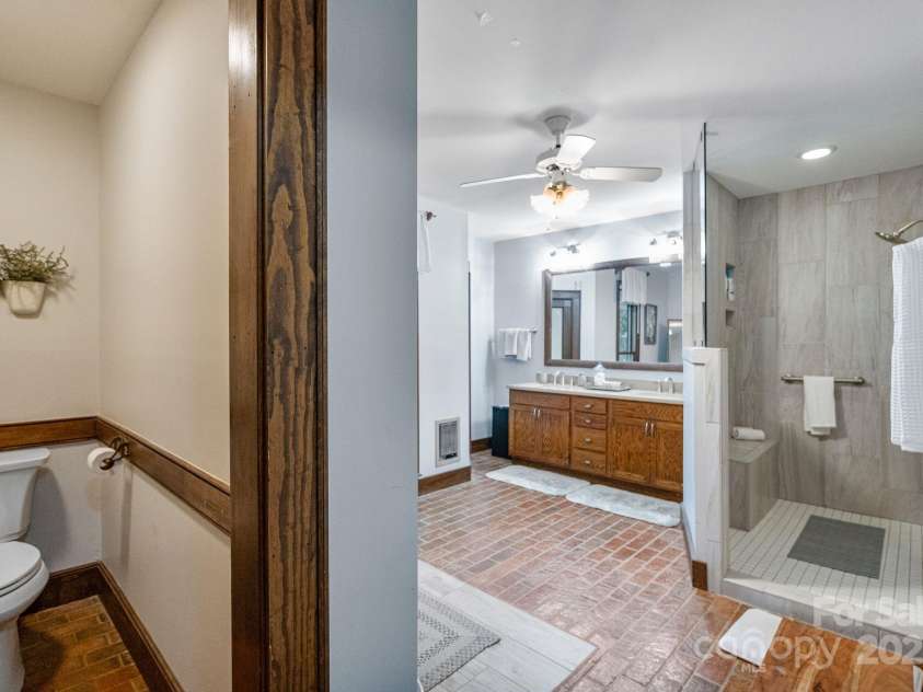 110 Amanda Drive, Matthews, NC 28104.  MLS# CAR4280480, YatesRealty ID 28865. Updated primary bathroom