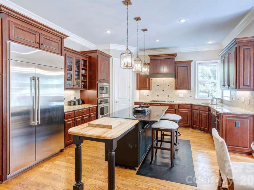 6005 Willowood Road, Kannapolis, NC 28081.  MLS# CAR4389697, YatesRealty ID 28865. Chefs kitchen with 2025 GE Cafe Refrigerator
