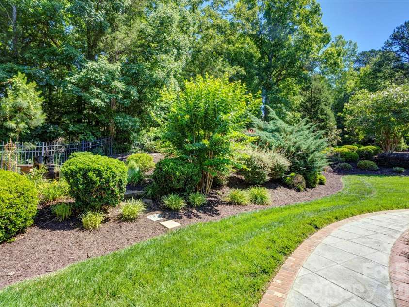 6005 Willowood Road, Kannapolis, NC 28081.  MLS# CAR4389697, YatesRealty ID 28865. Side yard