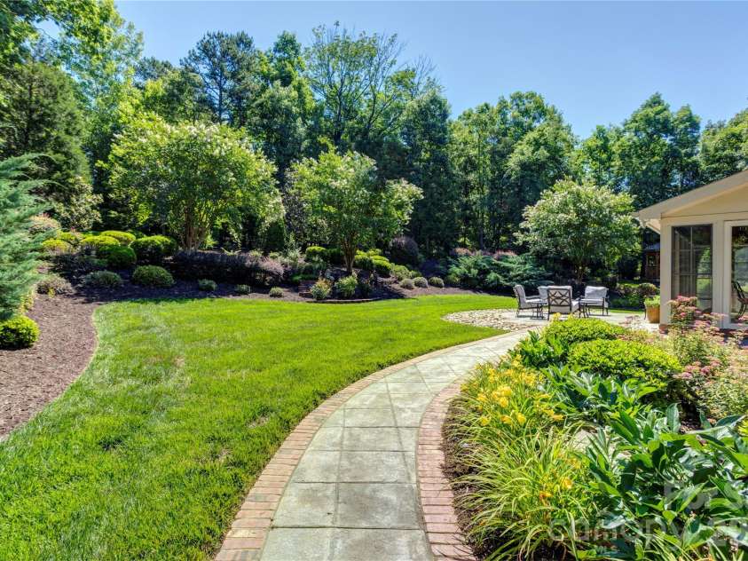 6005 Willowood Road, Kannapolis, NC 28081.  MLS# CAR4389697, YatesRealty ID 28865. Yard from drive area