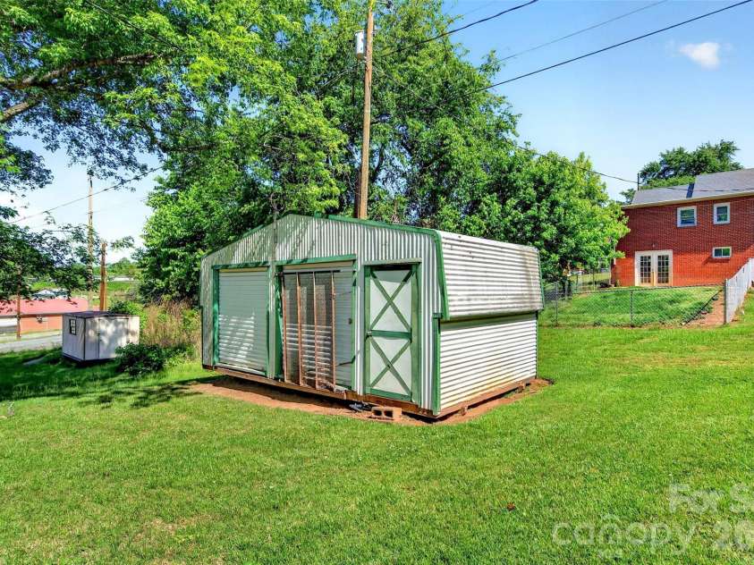 35 Second Street, Marion, NC 28752.  MLS# CAR4376895, YatesRealty ID 28866. Backyard storage building
