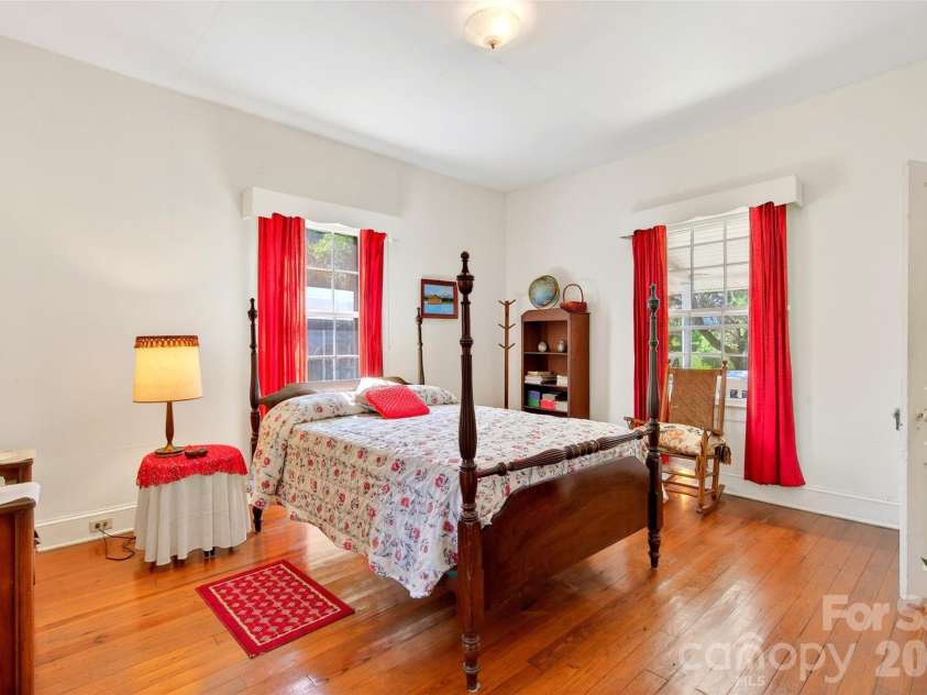 35 Second Street, Marion, NC 28752.  MLS# CAR4376895, YatesRealty ID 28866. Primary bedroom with wood flooring