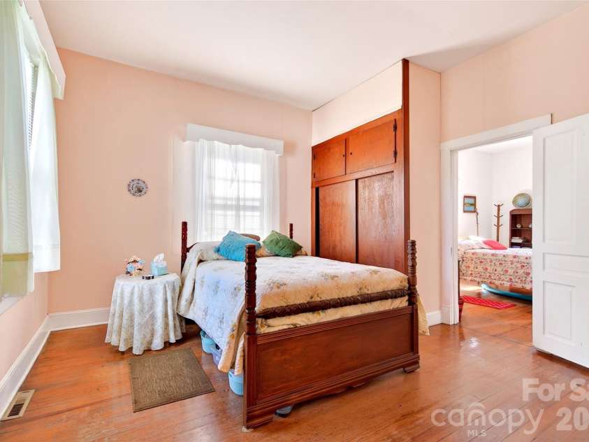 35 Second Street, Marion, NC 28752.  MLS# CAR4376895, YatesRealty ID 28866. Second bedroom with wood flooring