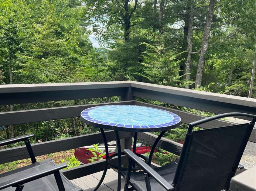 384 Bear Cub Drive, Spruce Pine, NC 28777.  MLS# CAR4389087, YatesRealty ID 28869. Enjoy a meal outside