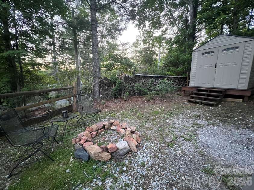 384 Bear Cub Drive, Spruce Pine, NC 28777.  MLS# CAR4389087, YatesRealty ID 28869. Front yard with shed #1