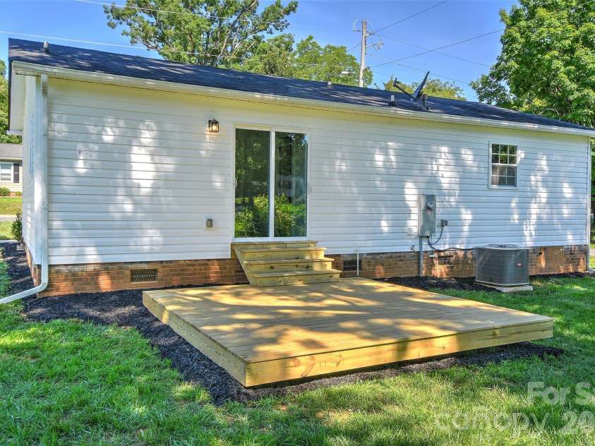 301 Branch Street, Monroe, NC 28112.  MLS# CAR4385417, YatesRealty ID 28871. New deck to enjoy large back yard