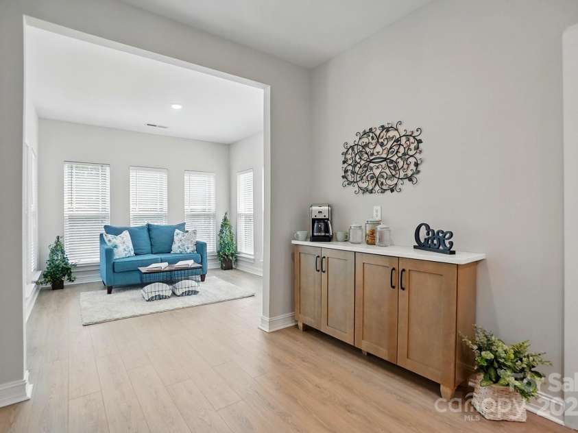 8726 Castle Cliff Drive, Matthews, NC 28105.  MLS# CAR4248763, YatesRealty ID 28871. A new, custom coffee bar has been added beside the pantry!