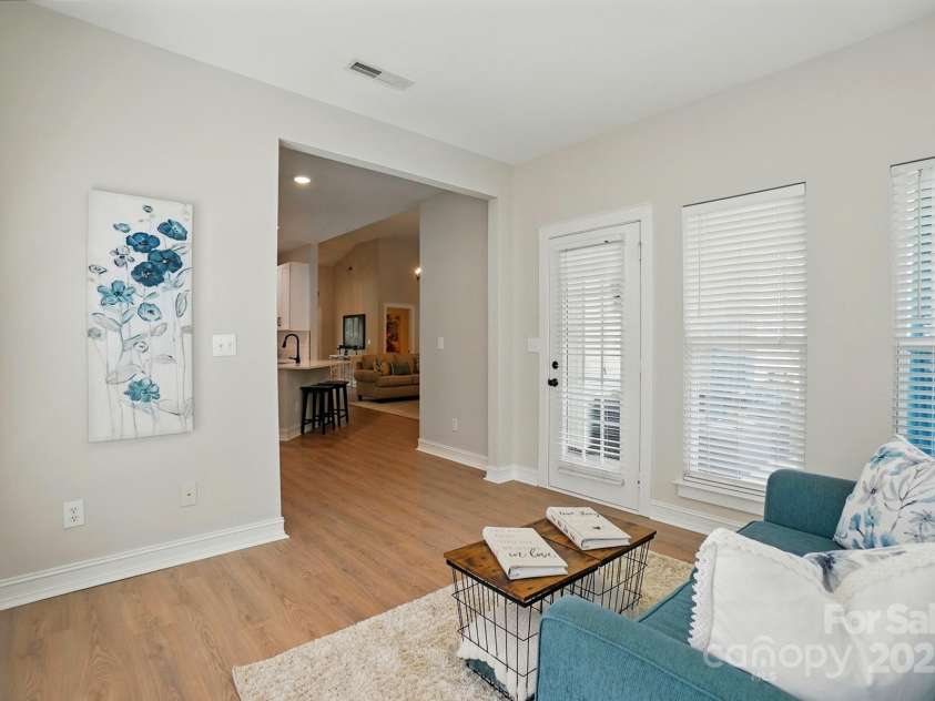 8726 Castle Cliff Drive, Matthews, NC 28105.  MLS# CAR4248763, YatesRealty ID 28871. View from sunroom into kitchen area