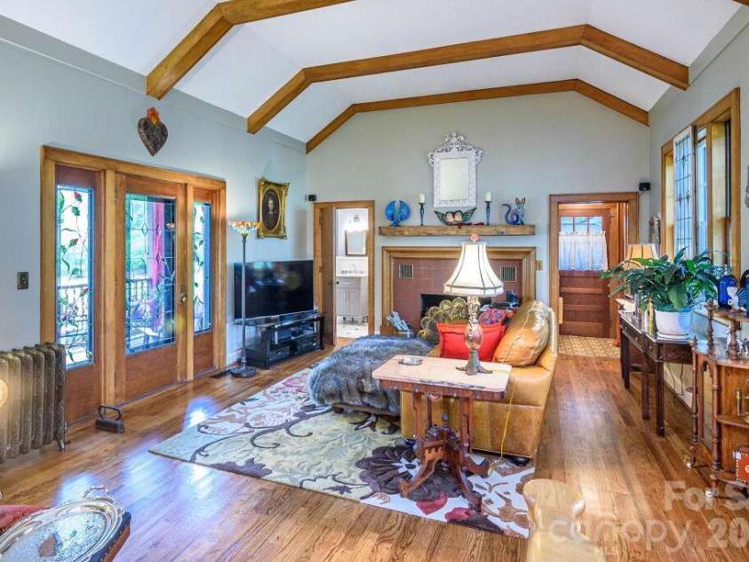 832 4th Avenue, Hendersonville, NC 28739.  MLS# CAR4390096, YatesRealty ID 28873. Great Room Opens to Covered Decking