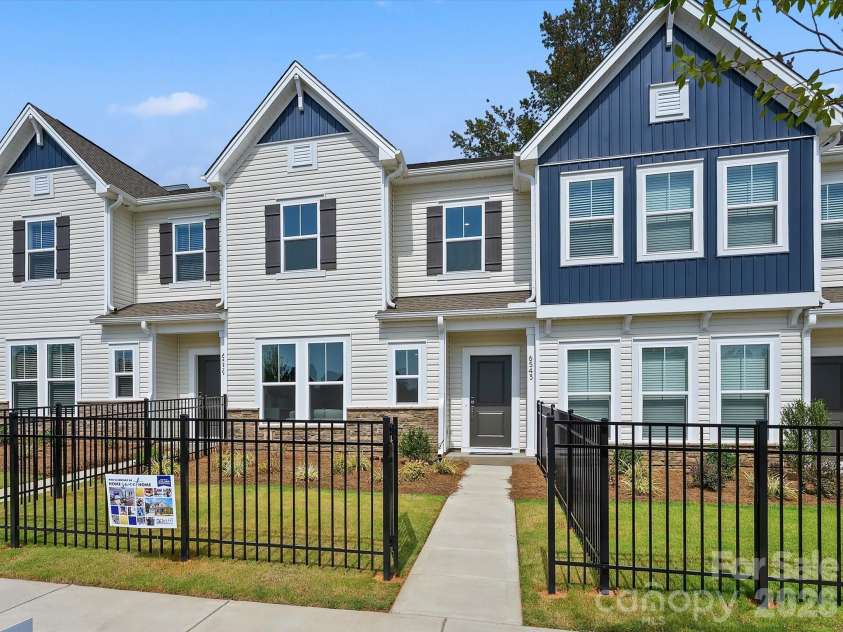 6543 Fire Lily Lane, Charlotte, NC 28216.  MLS# CAR4351859, YatesRealty ID 28876. Front Yard Fenced in for Privacy and Convenience