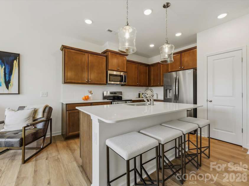 6543 Fire Lily Lane, Charlotte, NC 28216.  MLS# CAR4351859, YatesRealty ID 28876. Large Island Centered in Kitchen