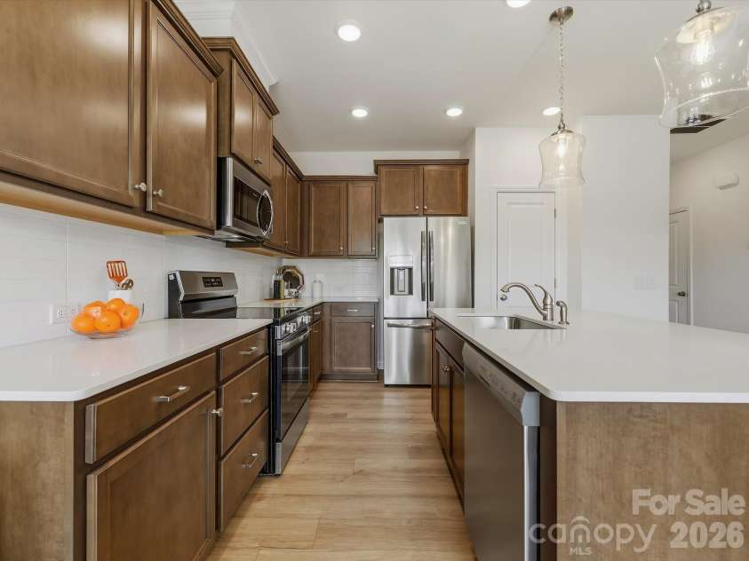 6543 Fire Lily Lane, Charlotte, NC 28216.  MLS# CAR4351859, YatesRealty ID 28876. Large Kitchen with Pantry