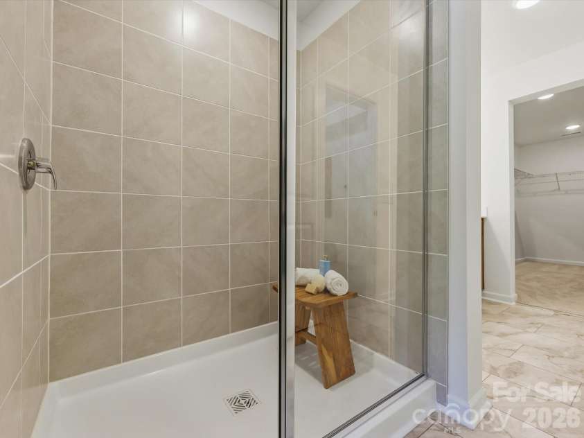 6543 Fire Lily Lane, Charlotte, NC 28216.  MLS# CAR4351859, YatesRealty ID 28876. Large Owner's Shower