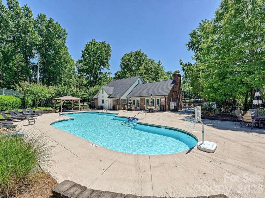 5203 Rustlewood Lane, Charlotte, NC 28226.  MLS# CAR4390578, YatesRealty ID 28877. Pool and clubhouse