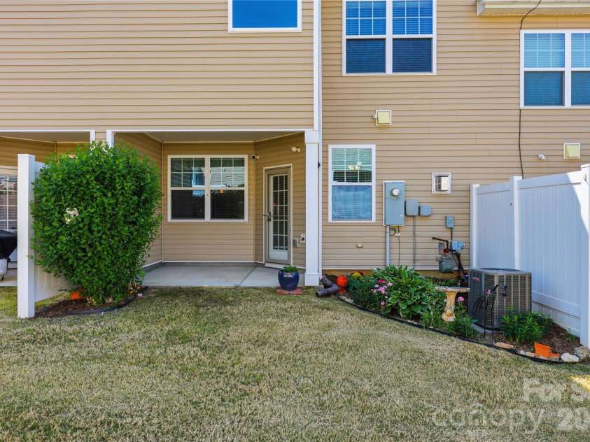 7431 Calhoun Falls Drive, Rock Hill, SC 29732.  MLS# CAR4372051, YatesRealty ID 28882. Covered Back Patio