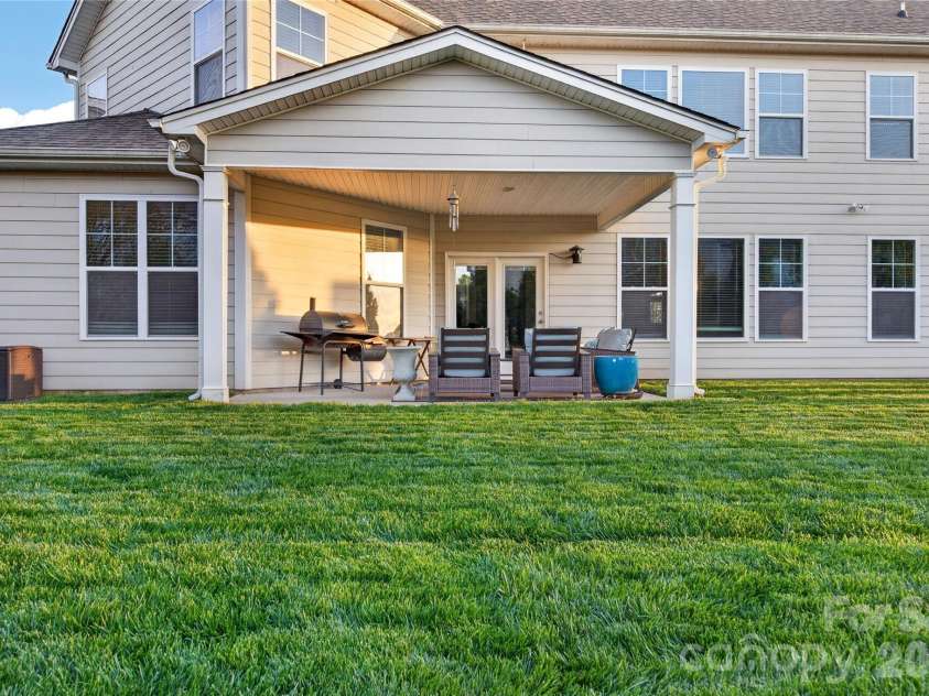 6216 Artigas Drive, Fort Mill, SC 29707.  MLS# CAR4380833, YatesRealty ID 28883. Covered Entertaining Patio