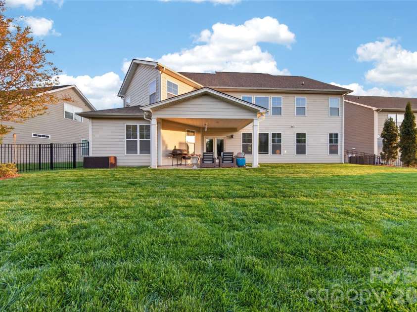 6216 Artigas Drive, Fort Mill, SC 29707.  MLS# CAR4380833, YatesRealty ID 28883. Flat Fenced Backyard
