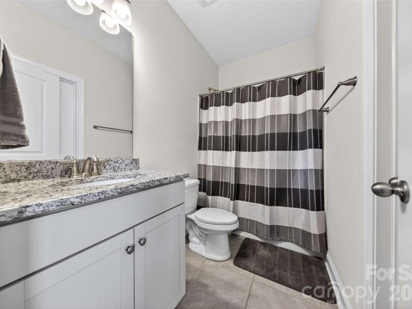 6216 Artigas Drive, Fort Mill, SC 29707.  MLS# CAR4380833, YatesRealty ID 28883. Guest Suite Bath
