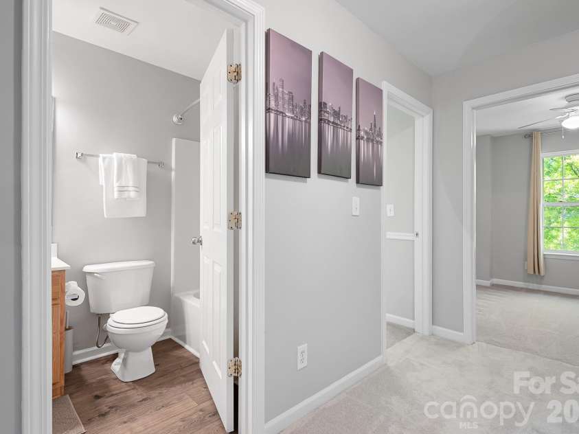 9648 Bailey Road, Cornelius, NC 28031.  MLS# CAR4368702, YatesRealty ID 28889. 3rd Floor Bathroom and Hallway