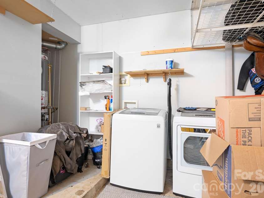 9648 Bailey Road, Cornelius, NC 28031.  MLS# CAR4368702, YatesRealty ID 28889. Laundry Area in the Garage
