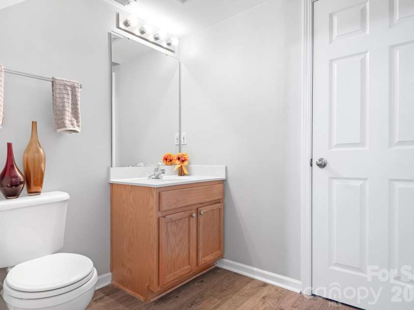 9648 Bailey Road, Cornelius, NC 28031.  MLS# CAR4368702, YatesRealty ID 28889. Main Level Half Bath