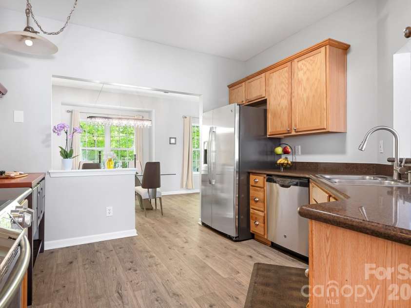 9648 Bailey Road, Cornelius, NC 28031.  MLS# CAR4368702, YatesRealty ID 28889. Upper Level Kitchen
