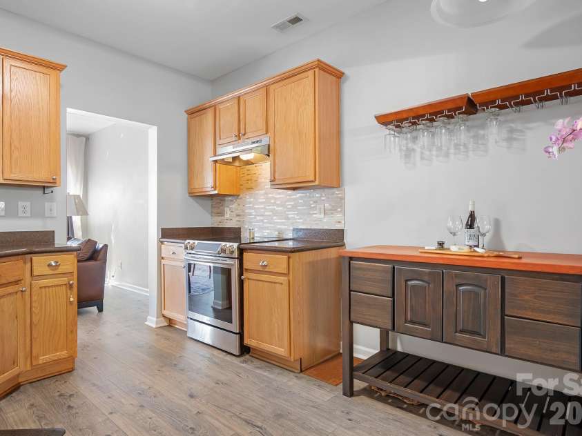 9648 Bailey Road, Cornelius, NC 28031.  MLS# CAR4368702, YatesRealty ID 28889. Upper Level Kitchen