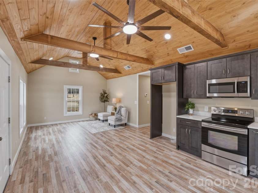 522 Mclelland Avenue, Mooresville, NC 28115.  MLS# CAR4333237, YatesRealty ID 2889. The perfect blend between rustic and modern design